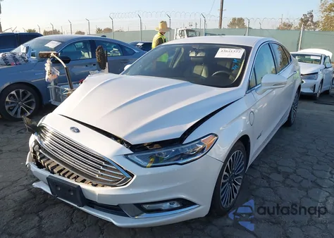 2017 Ford Fusion Energi Titanium from USA, damaged, VIN 3FA6P0SU3HR380491